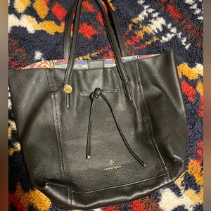 Nanette Lapore pebbled black handbag.